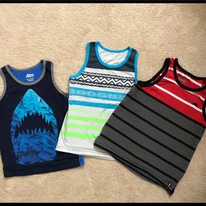 In great condition! 3 Boys Tanktops